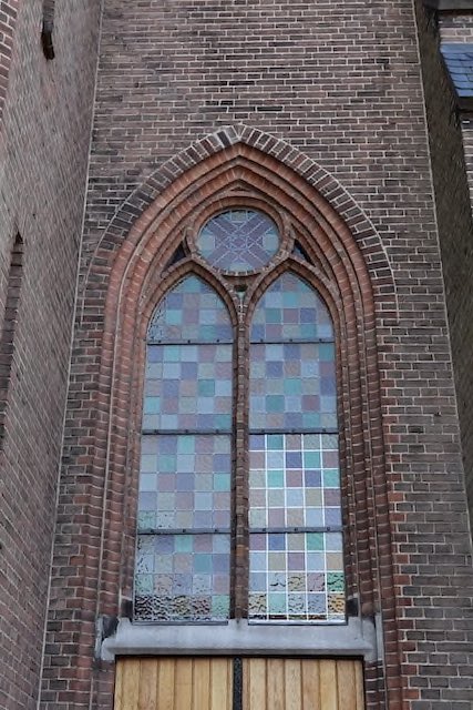 Glasherstel St. Jozefkerk Enschede glaszettersbedrijf Mellink Enschede